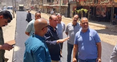حملات مكثفة فى بولاق الدكرور لرفع كفاءة الطرق وتحسين النظافة.. صور