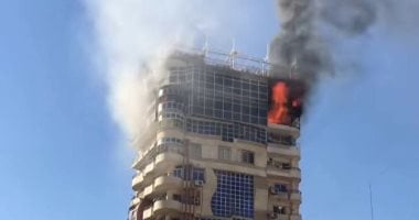 حريق هائل فى برج سكنى بشارع أسيوط فى سوهاج.. صور