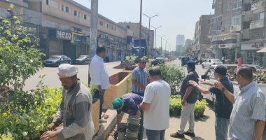 رفع كفاءة شارع العامل الأول بإمبابة بعد إخلائه من الإشغالات والتعديات